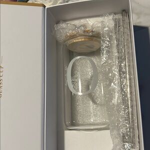 Elegant Glass Cup with Gold Accents.
Personalized with the letter O